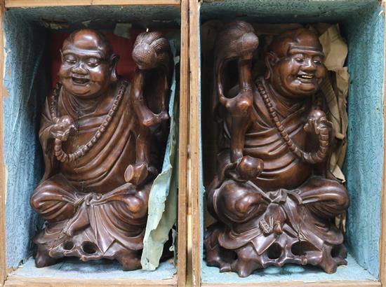 Two Chinese hardwood carvings, boxed, 12in.